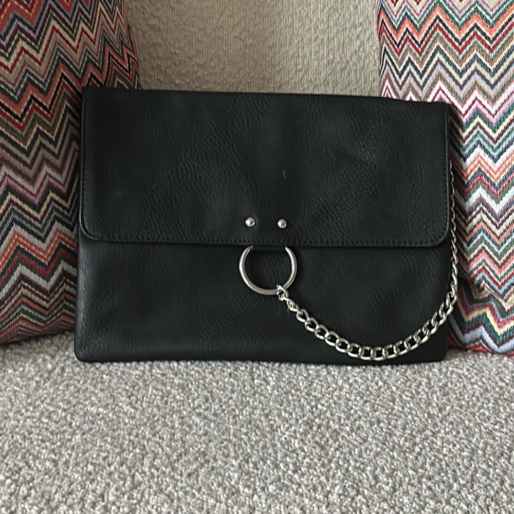 Sold. Beautiful clutch NWOT. Great for an evening out!  Fantastic chain detail